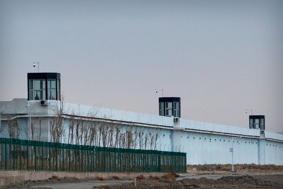 A guard patrols Number 3 Detention Center in Dabancheng in western China's Xinjiang Uyghur Autonomous Region.