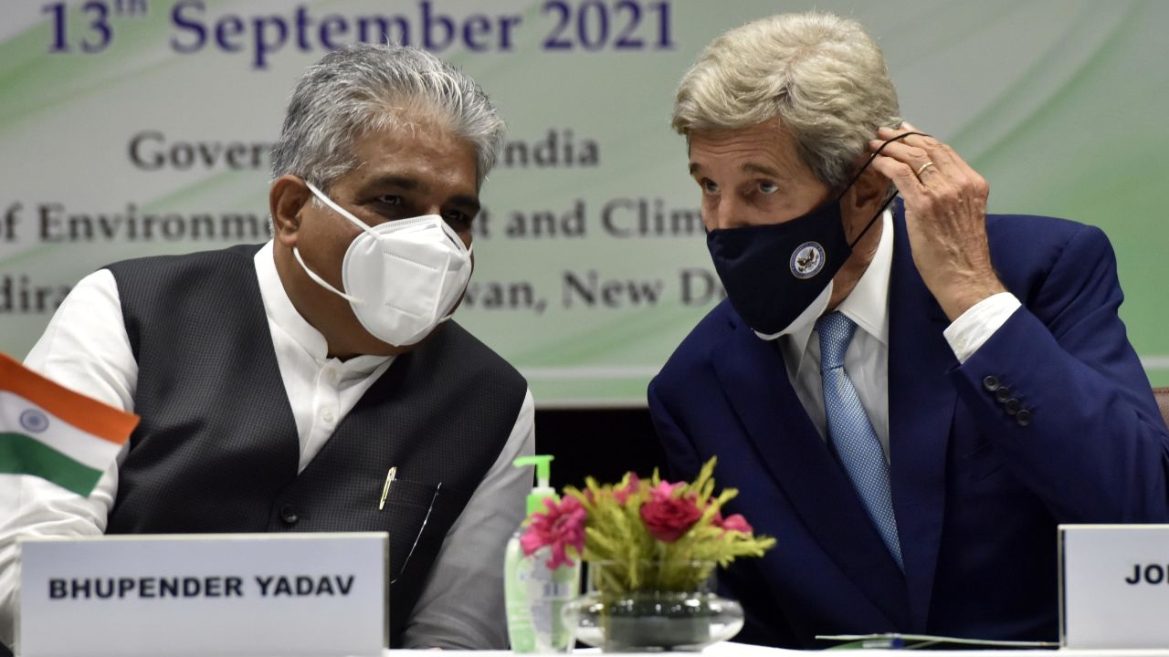 India's environment, forest and climate change minister Bhupender Yadav speaks with US climate envoy John Kerry in September.