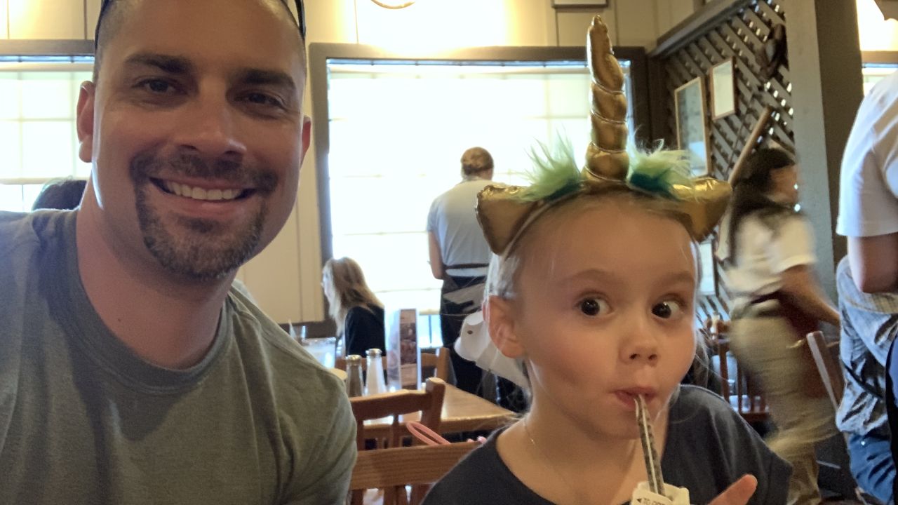 Brian Zach and Kaila share a father-daughter moment.