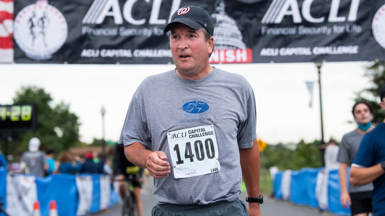 Justice Brett Kavanaugh crosses the finish line during the ACLI Capital Challenge 3-Mile Team Race in Anacostia Park in Washington, DC, on Wednesday, September 29, 2021. 