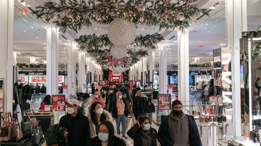 With Christmas only one day away, holiday shoppers make a last-minute trip to the Macy's flagship department store in Midtown, Manhattan on December 24, 2020 in New York City. Despite persisting social distancing recommendations and many turning to online retailers, large crowds filled the streets of New York City's commercial districts Thursday.