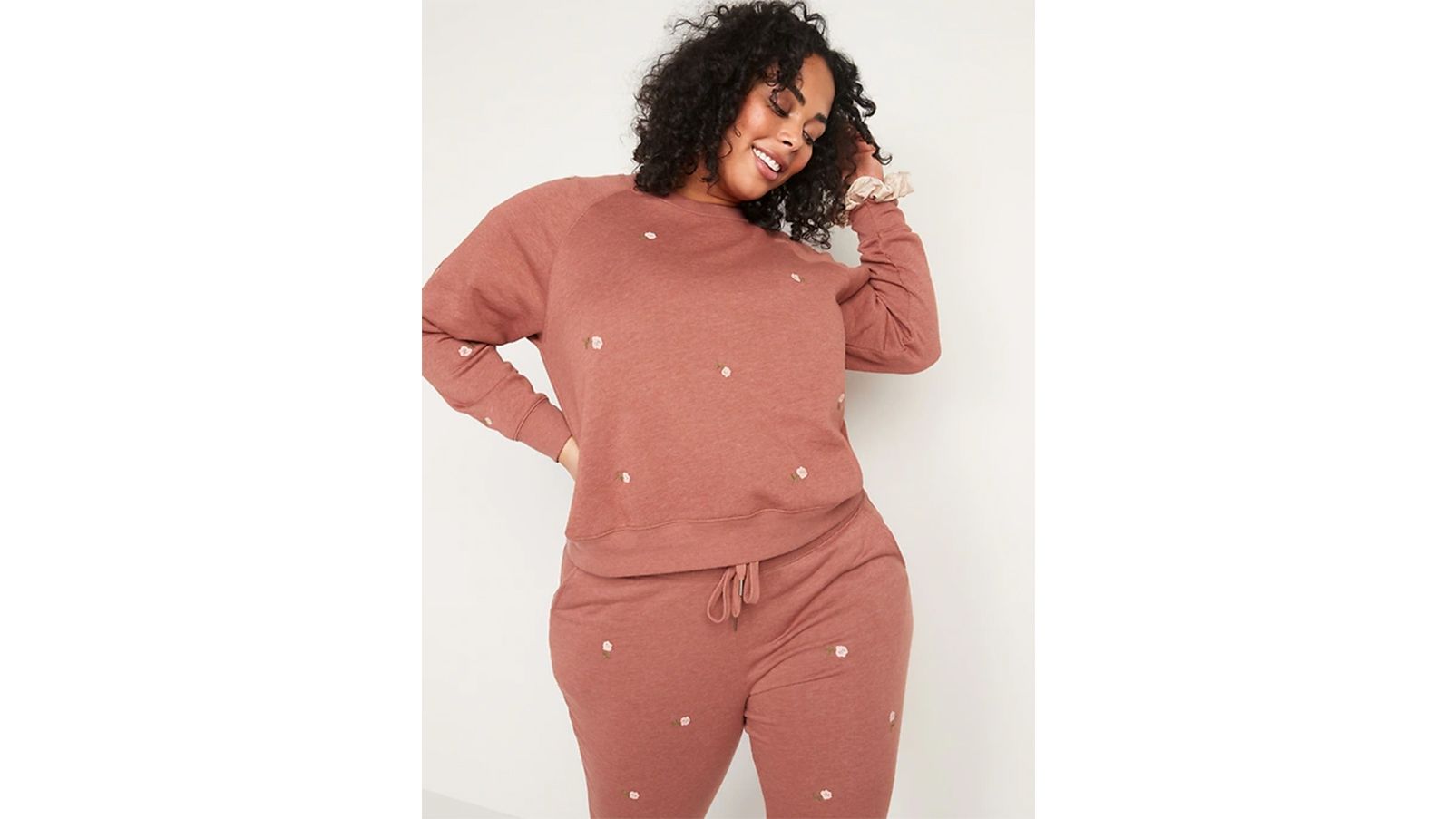 Young Woman in a Matching Sweatsuit Set · Free Stock Photo