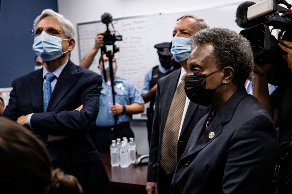 US Attorney General Merrick Garland (left), with Sen. Dick Durbin and Chicago Mayor Lori Lightfoot, visited Chicago in July. Chicago is among the five cities at the center of the Department of Justice's newest anti-gun trafficking strike forces.