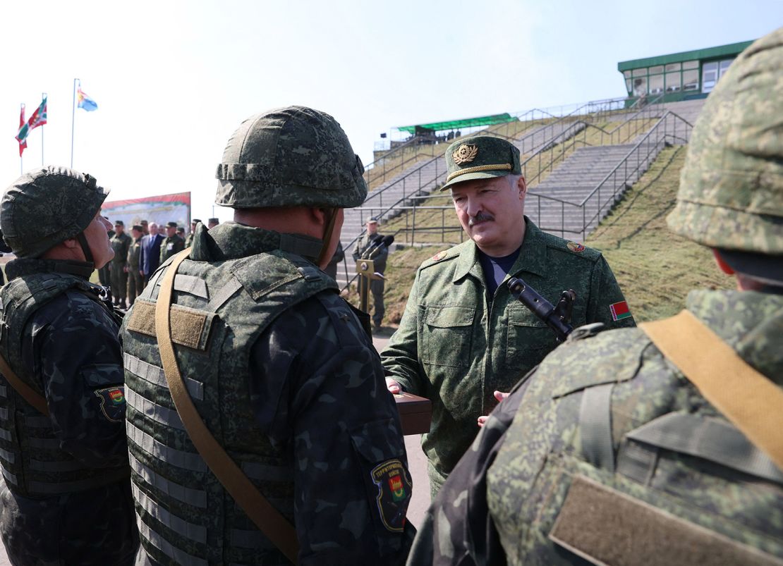 Lukashenko, here with troops near the Polish and Ukrainian borders, paints himself as a strongman.