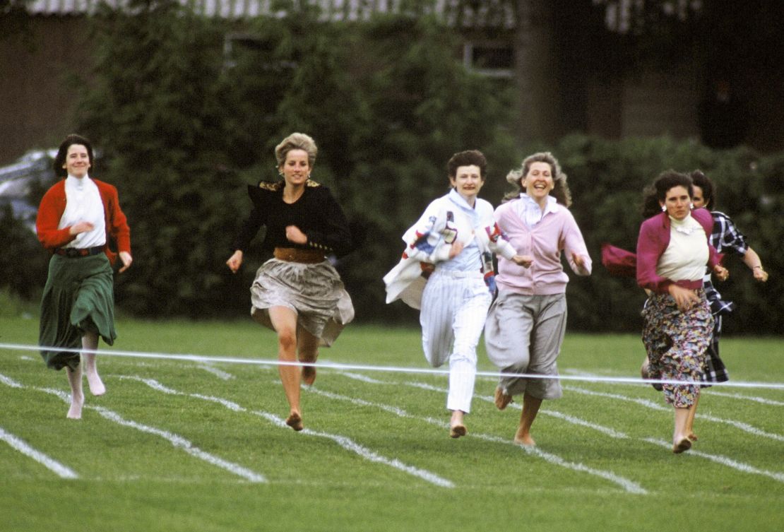Diana runs barefoot as she takes part in the Mother's race during Prince Harry's school sports day on June 11, 1991.