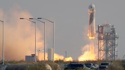 VAN HORN, TEXAS - JULY 20:  The New Shepard Blue Origin rocket lifts-off from the launch pad carrying Jeff Bezos along with his brother Mark Bezos, 18-year-old Oliver Daemen, and 82-year-old Wally Funk prepare to launch on July 20, 2021 in Van Horn, Texas. Mr. Bezos and the crew are riding in the first human spaceflight for the company.   (Photo by Joe Raedle/Getty Images)