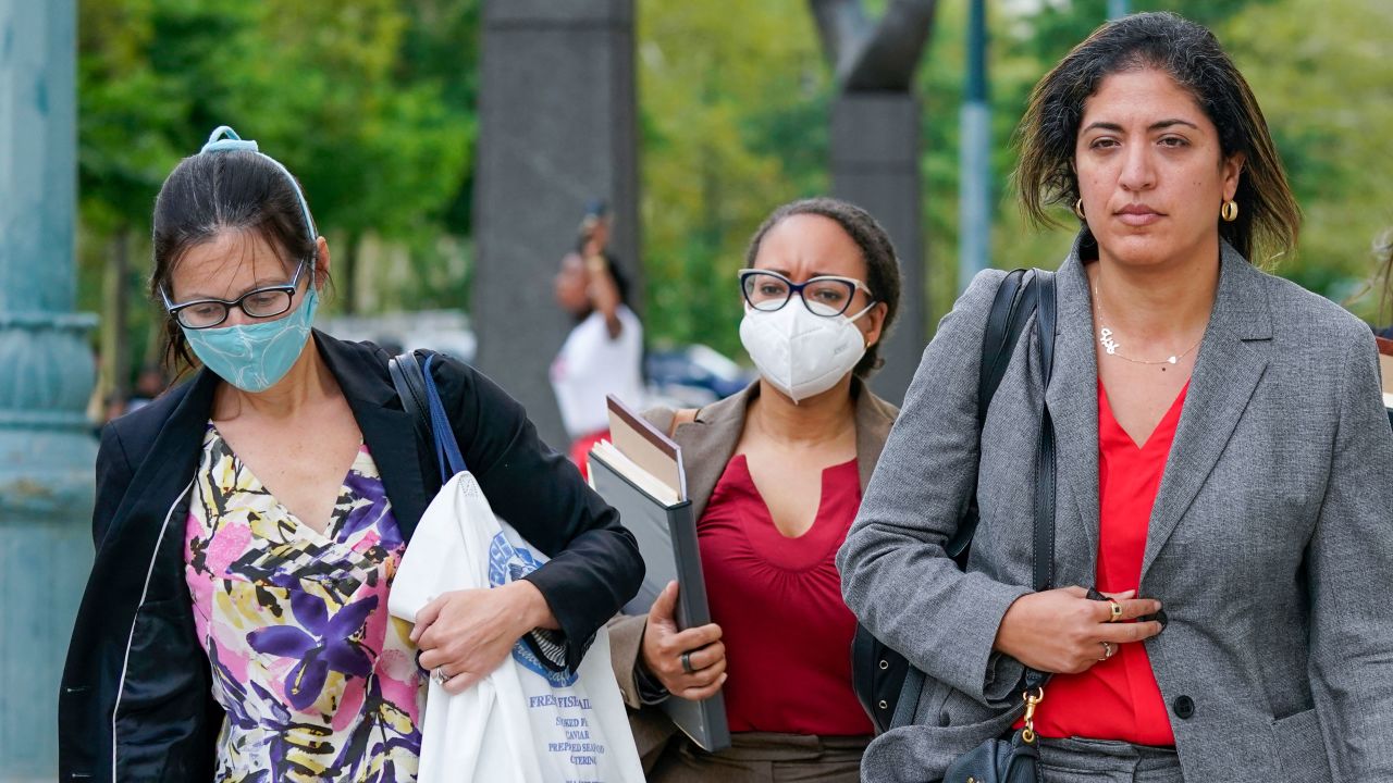 Assistant United States Attorneys Elizabeth Geddes, left, Maria Cruz Melendez, second from left, and Nadia Shihata, second from right, leave Brooklyn federal court on Thursday, Aug. 19, 2021.