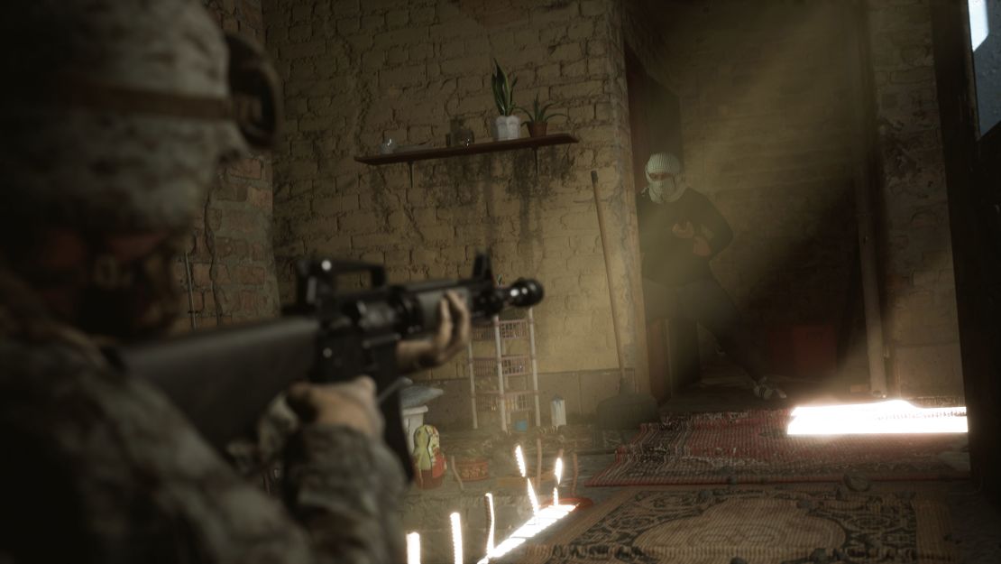 A scene from "Six Days in Fallujah" shows a US serviceman aiming his weapon at an Iraqi man wearing a traditional headdress.