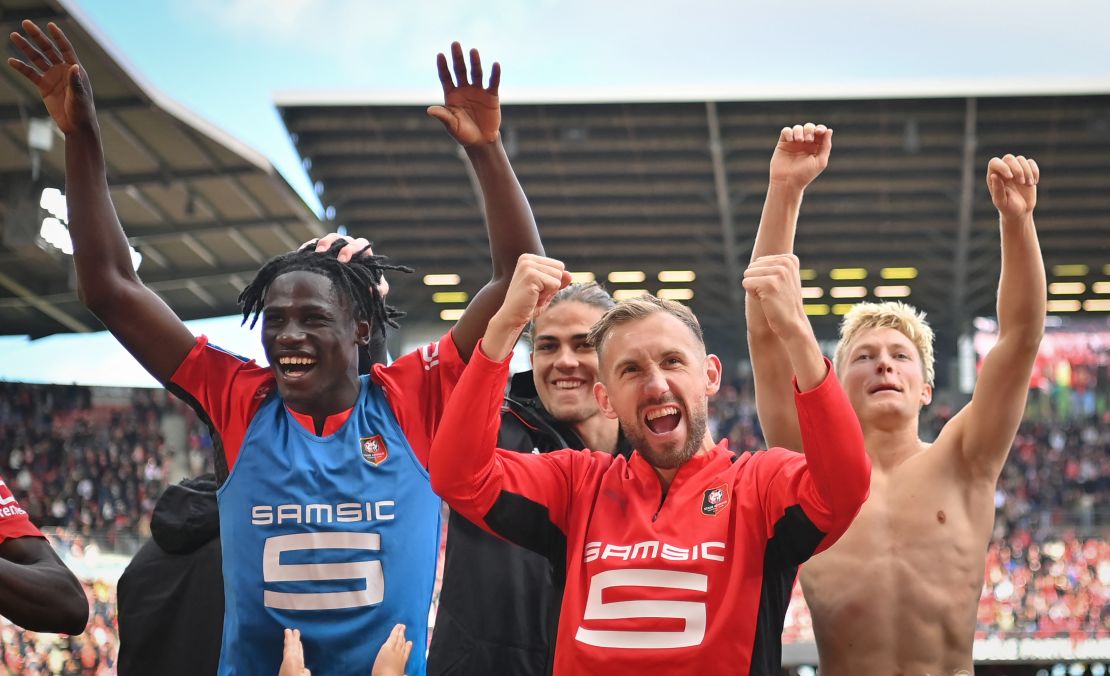 Rennes' players celebrate a famous win against PSG. 