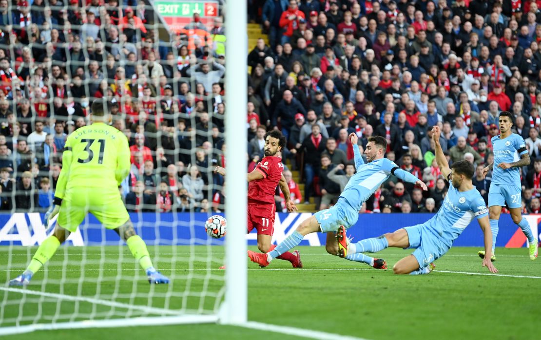 Mohamed Salah scores his sides second goal during the Premier League match against Manchester City.