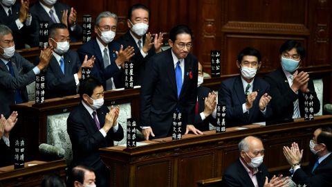 Fumio Kishida is applauded after being elected as Japan's new Prime Minister at the lower house of parliament in Tokyo on October 4.