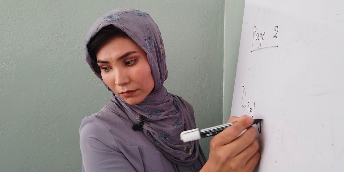 Atifa Watanyar teaches a class of young girls at the Sayed Al-Shuhada school in the outskirts of Kabul.