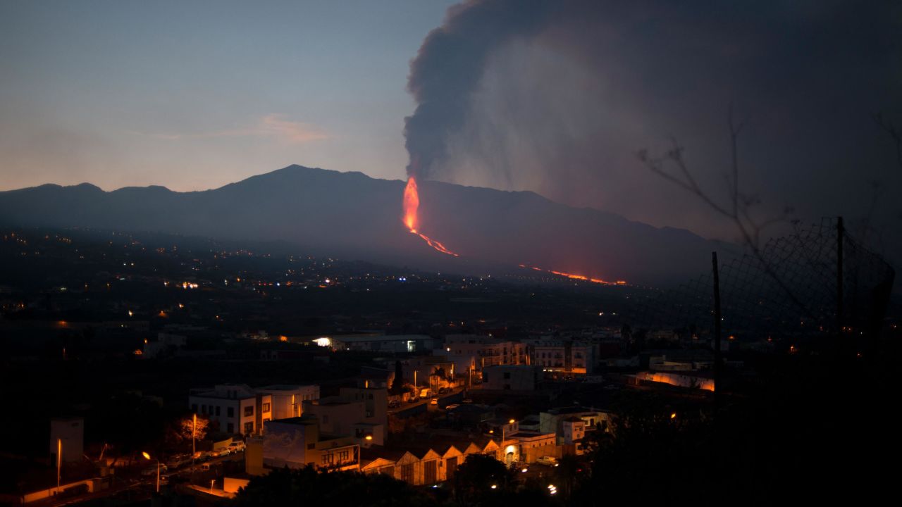 The Cumbre Vieja volcano spews lava, ash and smoke over Los Llanos de Aridane, on the Canary Island of La Palma, on Sunday.