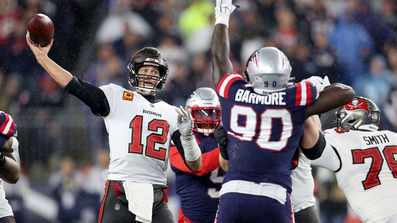 Brady throws a pass against the New England Patriots.
