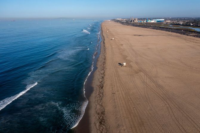 Waves bring oil ashore in Huntington Beach.