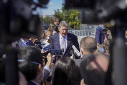 Sen. Joe Manchin, D-W.Va., speaks to members of the media outside the Capitol in Washington on Thursday, September 30, 2021.