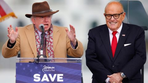 Attorney John Eastman gestures as he speaks next to then-US President Donald Trump's personal attorney Rudy Giuliani, as Trump supporters gather ahead of the president's speech to contest the certification by Congress of the results of the 2020 presidential election on the Ellipse in Washington, on January 6, 2021. 