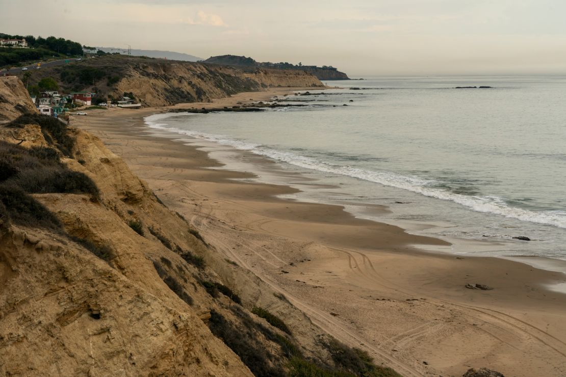 A darkened beach near Newport Beach, California, in the affected area of the oil spill.