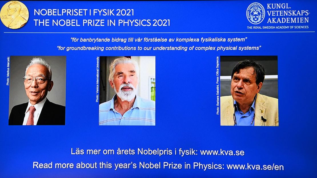 The co-winners of the 2021 Nobel Prize in physics (from left) Syukuro Manabe, Klaus Hasselmann and Giorgio Parisi on a screen at the Royal Swedish Academy of Sciences in Stockholm, on October 5.