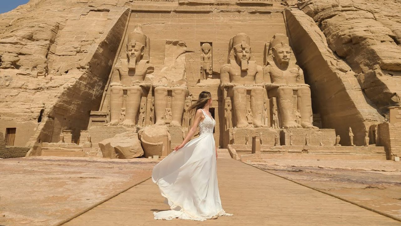 <strong>Making the most of a dress: </strong>Samantha Mathew is determined to get plenty of wear out of her wedding gown. Here she's pictured at Abu Simbel in Egypt during an anniversary trip in 2021. 