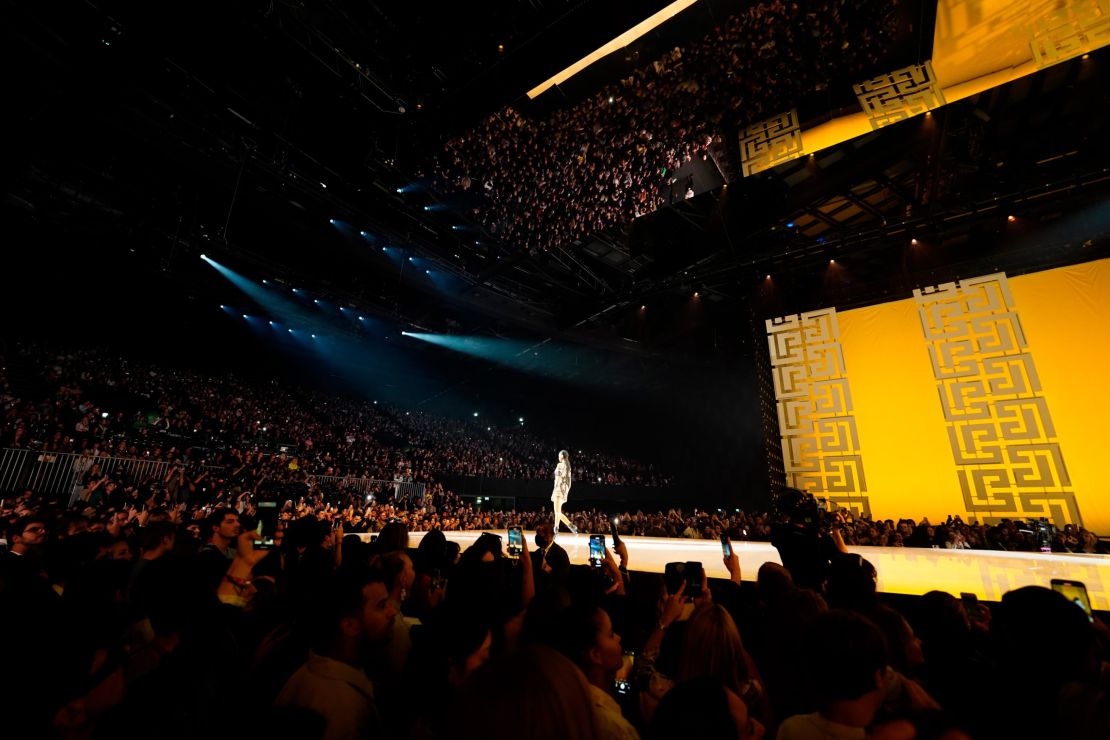 A model walks the runway during the Balmain Festival as part of Paris Fashion Wee at La Seine Musicale.