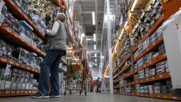 Customers wearing protective masks shop for items at a Home Depot store in Pleasanton, California, U.S., on Monday, Feb. 22, 2021. Home Depot Inc. is expected to release earnings figures on February 23. 