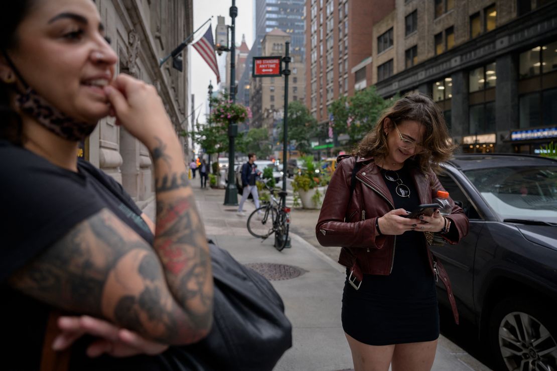 A woman checks her Instagram account Monday in New York City. The outage affected billions of people worldwide. 