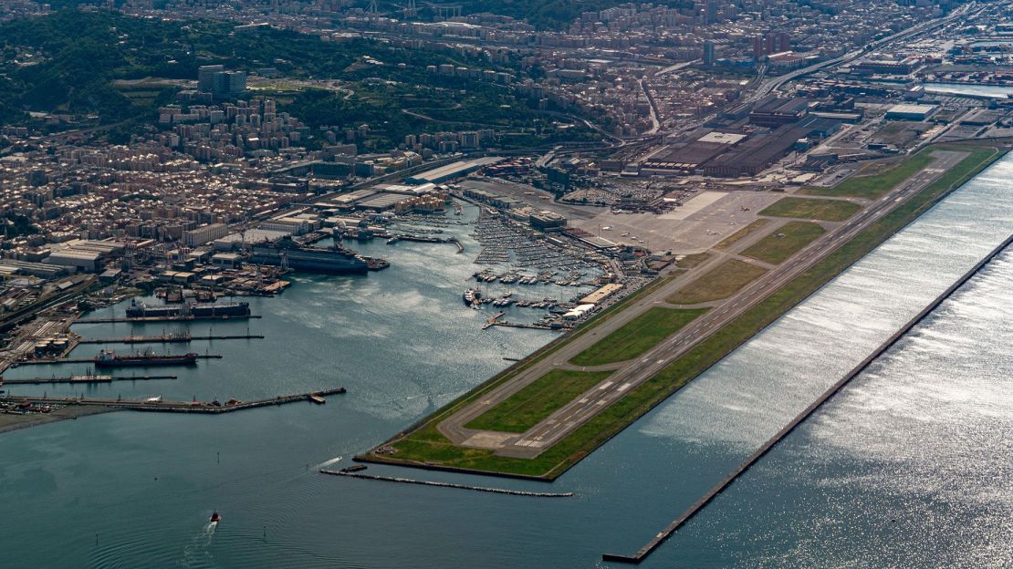 TWEDTD genoa airport and harbor aerial view panorama from airplane