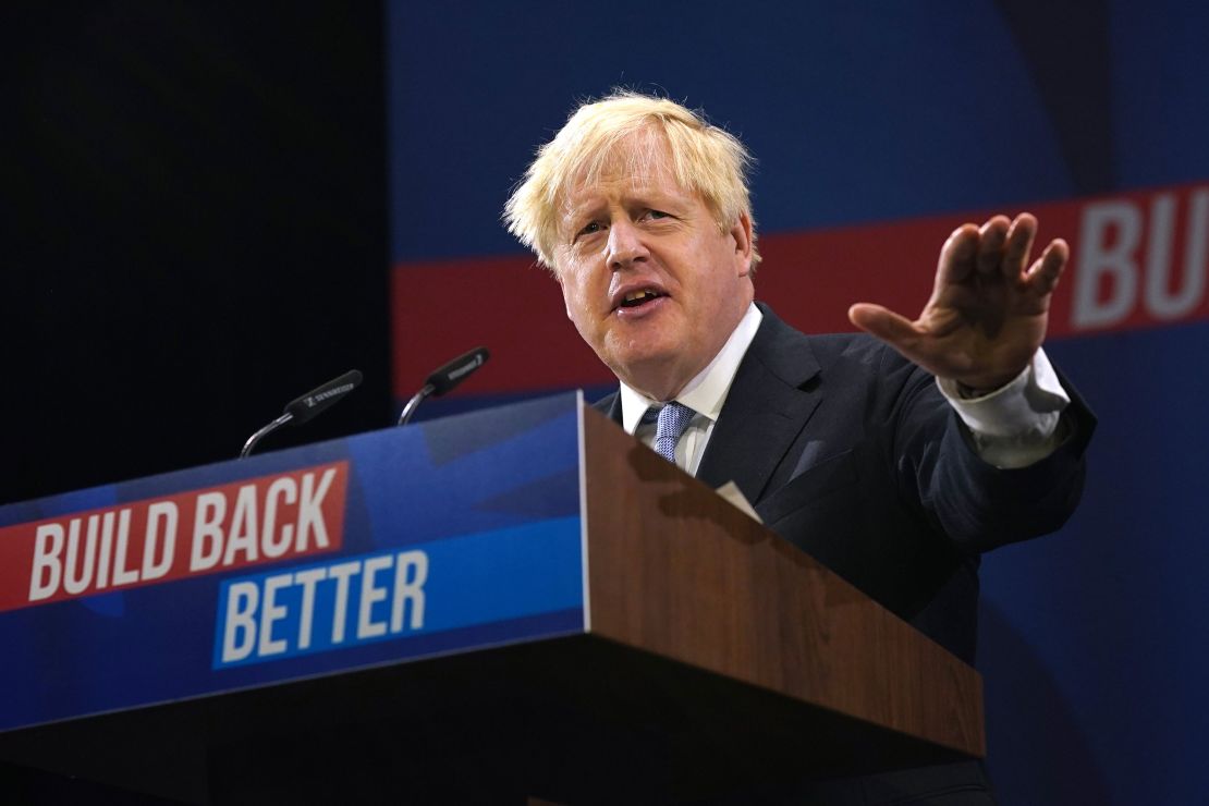 Boris Johnson delivers the keynote speech during the Conservative Party conference in Manchester on October 6, 2021.