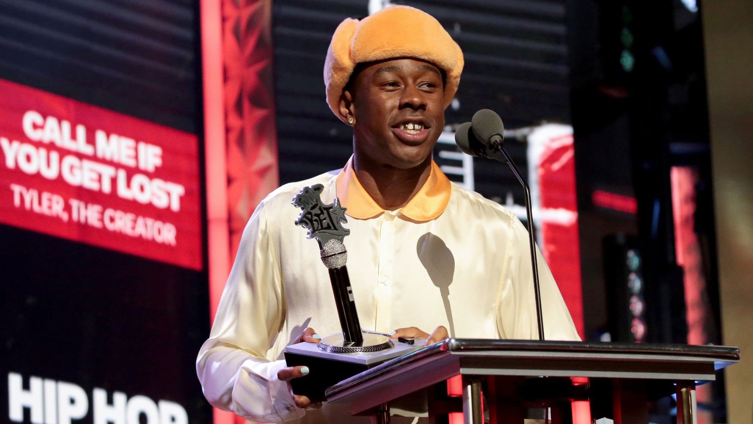 Tyler, the Creator accepts the award for hip hop album of the year at the BET Awards. 