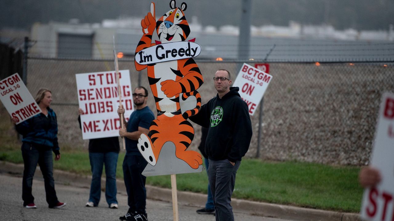 First shift worker Travis Huffman joins other BCTGM Local 3G union members in a strike against Kellogg Co. at the Kellogg's plant on Porter Street in Battle Creek, Michigan