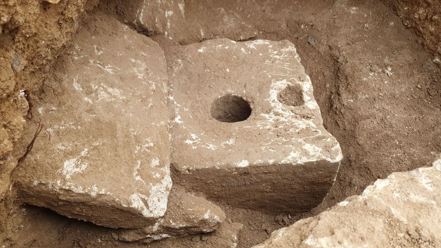 The rare ancient toilet is made from limestone.