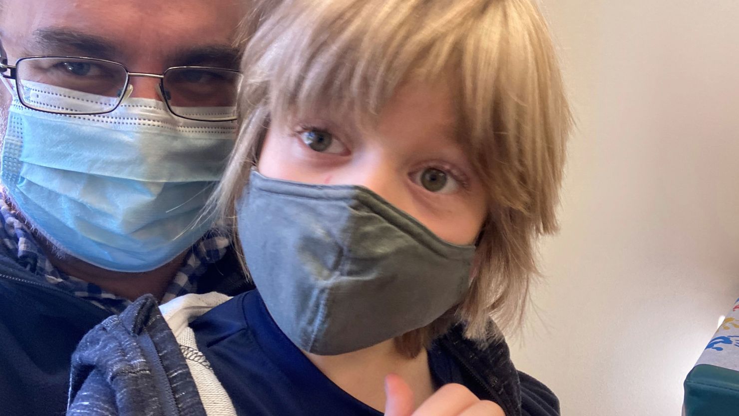 Matt Volz and son Thomas take a selfie while waiting for a Covid-19 test in Helena, Montana, on Sept. 22.