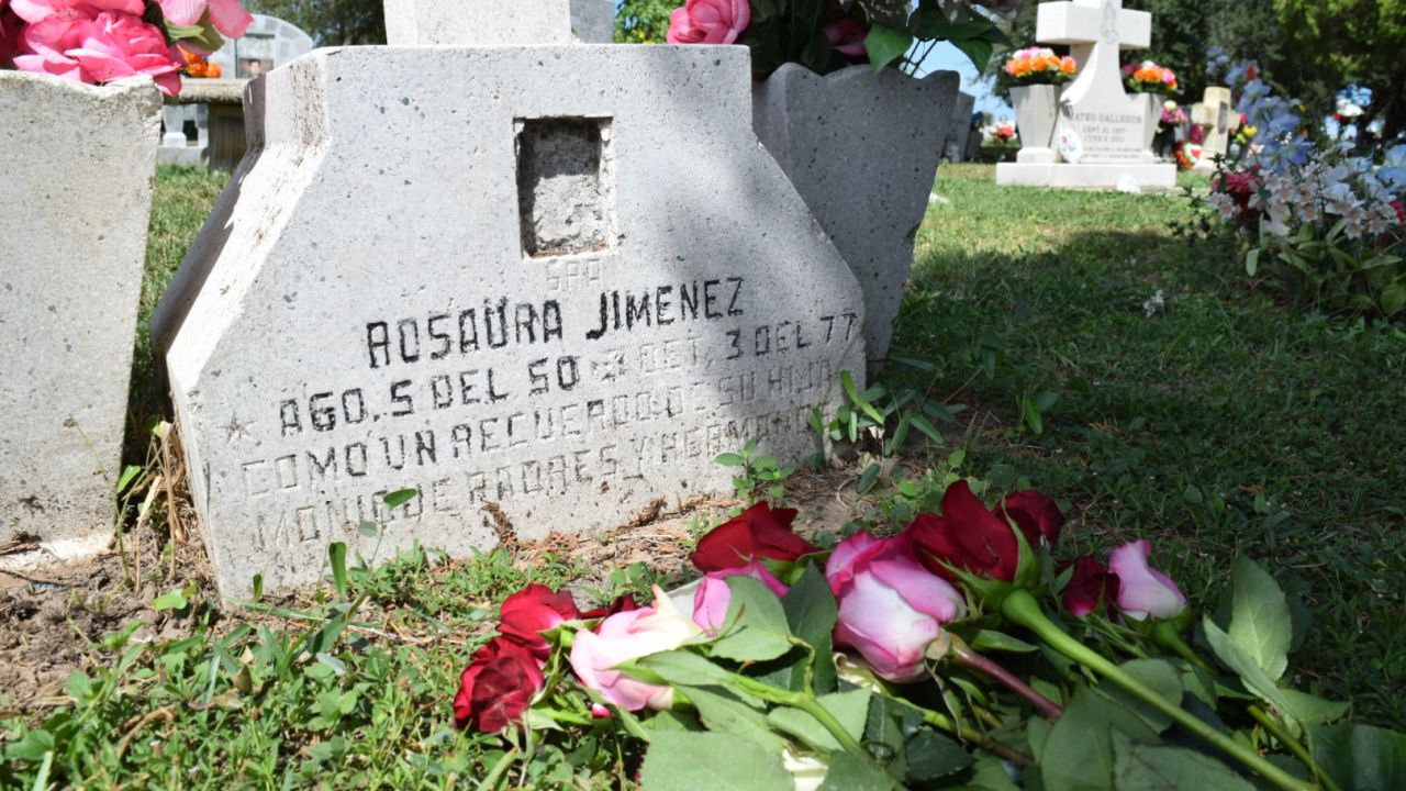 About a dozen roses lay upon the grave of Rosie Jimenez at the historic La Piedad Cemetery in McAllen, Texas, on October 2.