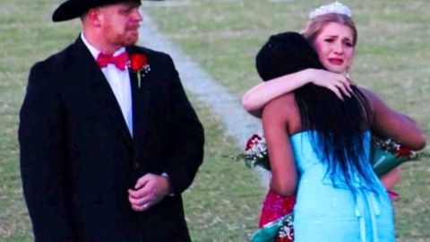 Brittany Walters hugs Nyla Covington after she passed along her crown.