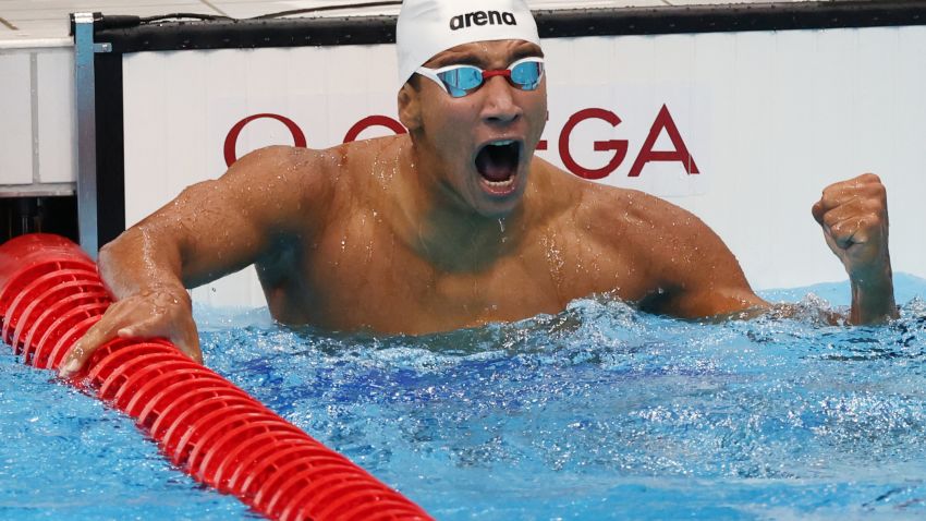 TOKYO, JAPAN - JULY 25: Ahmed Hafnaoui of Team Tunisia celebrates after winning the Men's 400m Freestyle Final on day two of the Tokyo 2020 Olympic Games at Tokyo Aquatics Centre on July 25, 2021 in Tokyo, Japan. (Photo by Tom Pennington/Getty Images)