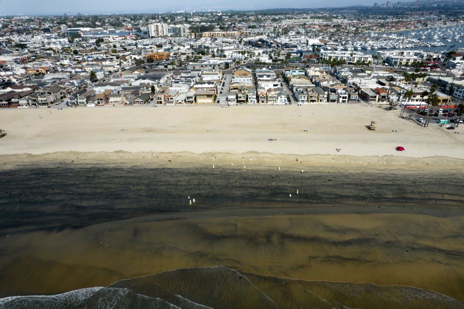 Oil-stained sand is seen in Newport Beach, California, on Wednesday, October 6.
