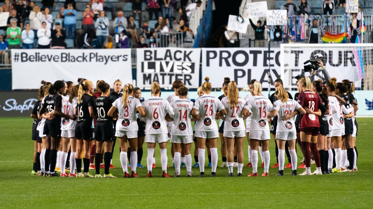 Players stop the match during the first half of a NWSL soccer match between NJ/NY Gotham FC and the Washington Spirit in a protest at Subaru Park in Chester, Pennsylvania. 