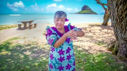 Linda Yuen Lambrecht demonstrates the sign for "fish" in the critically endangered Hawaii Sign Language (HSL). Experts estimate fewer than ten people in the world can use HSL fluently.