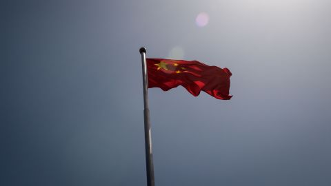 The Chinese national flag is seen at the entrance to the Zhongnanhai leadership compound in Beijing on May 18, 2020. 