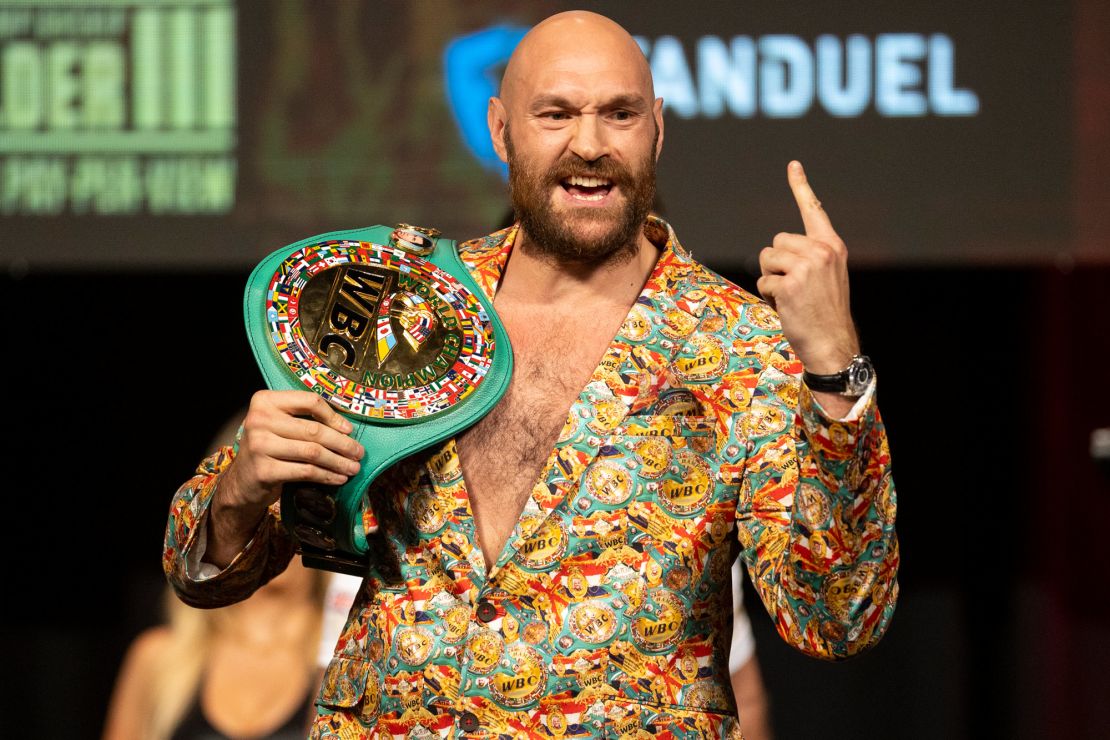 Fury poses during a news conference.