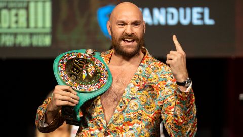 Fury poses during a news conference.