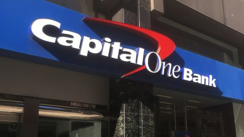 Underlined Capital One Bank exterior sign on the street