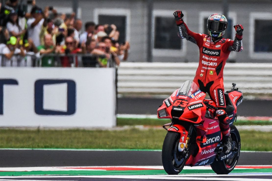 Bagnaia celebrates after winnign the San Marino MotoGP Grand Prix.
