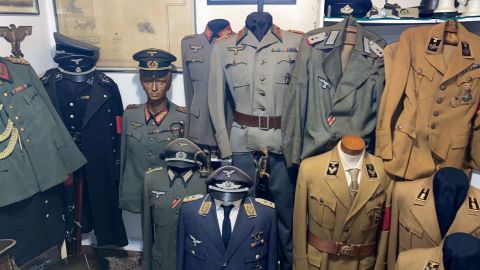 Nazi clothes seized from the property in a handout photograph released on October 6, 2021.