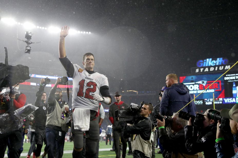 Brady runs off the field after the Buccaneers defeated his former team, the New England Patriots, in October 2021. It was <a href="https://www.cnn.com/2021/10/04/sport/tom-brady-new-england-patriots-return-spt-intl/index.html" target="_blank">Brady's first game back in New England</a> since he left the franchise in 2020.