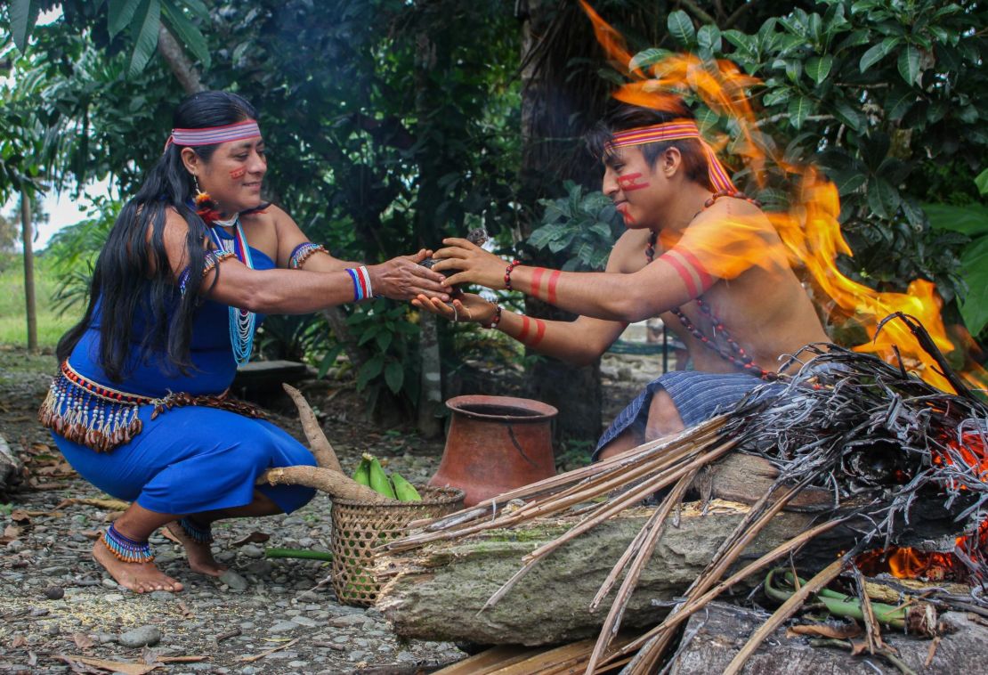Traditionally the Shuar people have been self-sufficient and self-governing. Pictured is Sayda Unkuch with her son Kaar Mashingashi in Chumpias, Ecuador.