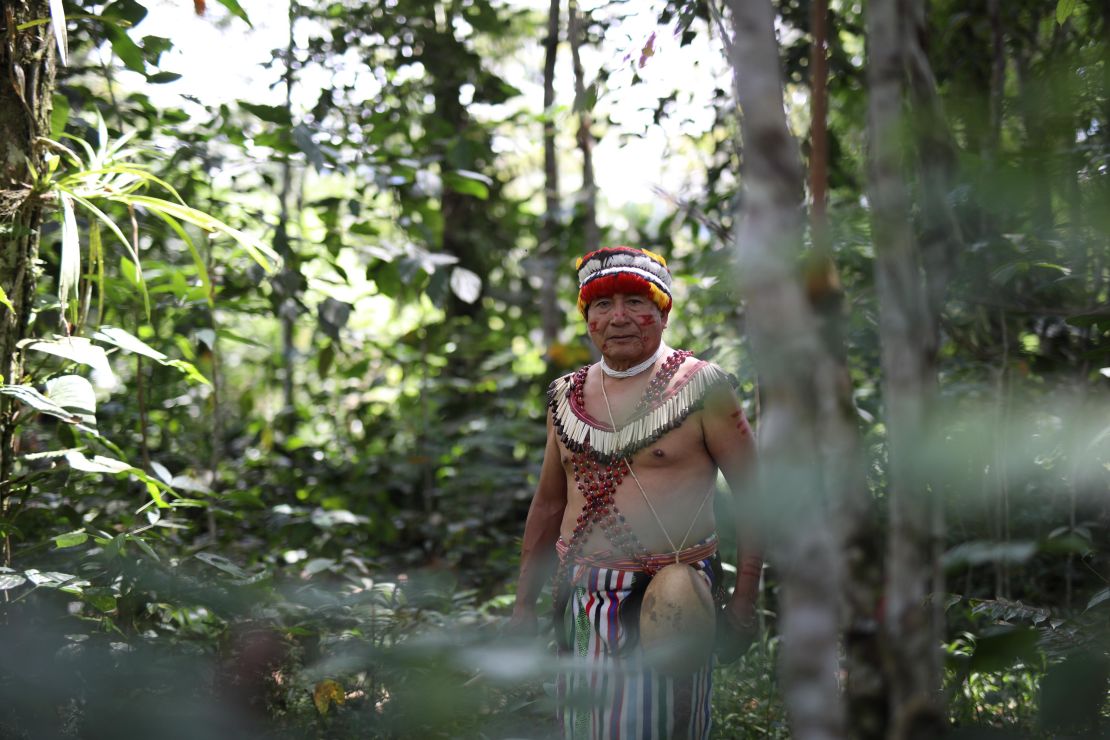 The Shuar people live in the jungle mountain range that straddles Ecuador and Peru. Pictured is Tomás Unkuch, from a Shuar community in Chumpias, in the Morona Santiago province of Ecuador.