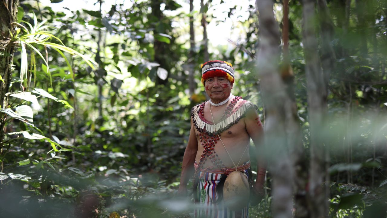 The Shuar people live in the jungle mountain range that straddles Ecuador and Peru. Pictured is Tomás Unkuch, from a Shuar community in Chumpias, in the Morona Santiago province of Ecuador.