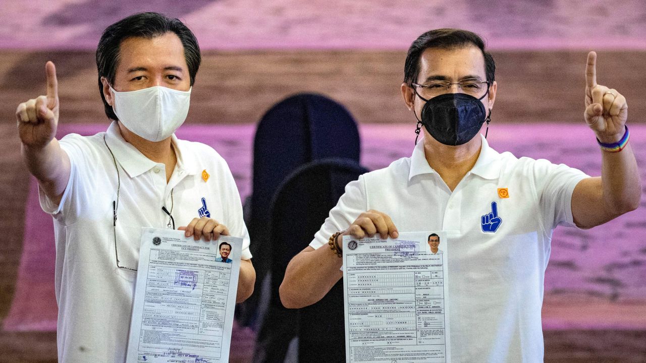 Manila Mayor Francisco Domagoso, right, known by his screen name Isko Moreno, and his running mate for vice president Willie Ong in Manila on October 4.
